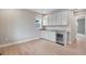 Modern wet bar with white cabinetry and wine cooler at 3432 N Gold Bug Ct, Aurora, CO 80019