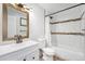 Updated bathroom featuring modern vanity, shower with white subway tile at 8666 Mariposa St, Thornton, CO 80260
