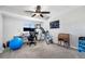 Bedroom featuring neutral carpet, a ceiling fan, and a desk at 8666 Mariposa St, Thornton, CO 80260