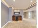 The basement is complete with a bar and built-in shelves at 7890 S Quatar, Aurora, CO 80016