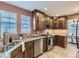 Well-equipped kitchen featuring stainless steel appliances and granite countertops at 7890 S Quatar, Aurora, CO 80016