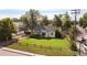 Well-maintained home featuring a lush lawn, traditional wooden fence, and mature landscaping at 6280 W 38Th Ave, Wheat Ridge, CO 80033