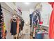 Walk-in closet with built-in shelving and racks for ample storage and a full-length mirror at 955 Eudora St # 801E, Denver, CO 80220