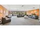 Spacious community room featuring comfortable seating, neutral decor and a fireplace at 955 Eudora St # 801E, Denver, CO 80220