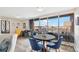 Bright dining area with great city views, a wooden table with seating, and stylish decor at 955 Eudora St # 801E, Denver, CO 80220