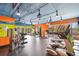Bright gym with treadmills, elliptical, and weight machines for a full workout at 955 Eudora St # 801E, Denver, CO 80220