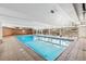 Indoor swimming pool with lounge area and large windows for natural light at 955 Eudora St # 801E, Denver, CO 80220