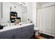 Stylish bathroom features double sinks, modern fixtures, and plenty of counter space at 4085 S Crystal Cir # 104, Aurora, CO 80014