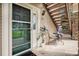 Charming entrance with seating area and unit number visible, showcasing a welcoming atmosphere at 4085 S Crystal Cir # 104, Aurora, CO 80014