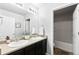 Bathroom with double sink vanity and shower and tub combo at 3488 Purcell St, Brighton, CO 80601