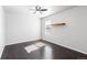 Bright bedroom with natural light from window and clean hardwood floors at 3488 Purcell St, Brighton, CO 80601