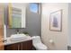 Well-lit bathroom with modern fixtures, vessel sink, and stylish tile work at 4511 Meade St, Denver, CO 80211