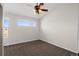 Bedroom features brown carpet, light walls and a ceiling fan with an overhead light at 4511 Meade St, Denver, CO 80211