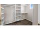 Walk-in closet featuring custom shelving at 4511 Meade St, Denver, CO 80211