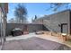 Backyard patio with stone fire pit and outdoor grill perfect for entertaining at 4511 Meade St, Denver, CO 80211