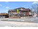 Exterior of brick restaurant with covered patio and string lights at 4511 Meade St, Denver, CO 80211