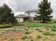 Two-story home with brick and siding featuring mature trees in an establishing neighborhood at 12904 N 3Rd St, Parker, CO 80134