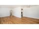 Open living room features refinished hardwood floors and ceiling fan at 1355 Rosemary St, Denver, CO 80220