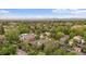 Lovely neighborhood view showcasing lush greenery, mature trees, and diverse architectural styles at 3341 Newton St, Denver, CO 80211