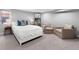 Bedroom featuring bed, chair, and gray carpet at 3341 Newton St, Denver, CO 80211