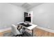 Cozy home office features a modern desk, comfortable chair, and wood floors at 3341 Newton St, Denver, CO 80211