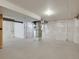 Unfinished basement space with concrete flooring and plastic-covered walls offers potential for customization at 17186 E Cedar Gulch Dr, Parker, CO 80134