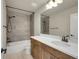 Well-lit bathroom with a tub-shower combo and modern fixtures at 17186 E Cedar Gulch Dr, Parker, CO 80134