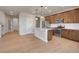 Modern kitchen with stainless steel appliances and granite countertops on the center island at 17186 E Cedar Gulch Dr, Parker, CO 80134