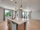 Spacious kitchen island with granite countertops and stainless steel dishwasher at 17186 E Cedar Gulch Dr, Parker, CO 80134