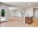 Open-concept living area with hardwood floors, large windows, and abundant natural light at 17186 E Cedar Gulch Dr, Parker, CO 80134