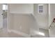 A bright stairwell features neutral walls and carpeted stairs at 17186 E Cedar Gulch Dr, Parker, CO 80134