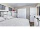 Bright bedroom with a queen-size bed and plenty of storage at 2391 Lansing St, Aurora, CO 80010