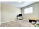 Simple bedroom with ample space for a TV and storage at 2391 Lansing St, Aurora, CO 80010