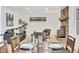 Inviting living area with a wood-burning stove, modern furniture, and an open layout at 8095 Johnson Ct, Arvada, CO 80005