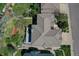 Aerial of house with new roof and landscaping including deck and patio at 16627 W 1St Ave, Golden, CO 80401