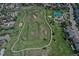 Aerial view of nearby park with walking paths, playground, and sport court at 16627 W 1St Ave, Golden, CO 80401