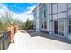 Spacious back deck with brick and iron railings offers views of the blue sky at 16627 W 1St Ave, Golden, CO 80401