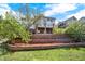 View of the house from the backyard showing patio and landscaping at 16627 W 1St Ave, Golden, CO 80401