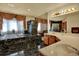 Lavish primary bathroom with black marble accents, a double sink vanity, and soaking tub at 16627 W 1St Ave, Golden, CO 80401