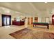 Large game room with a pool table, bar, and ample space for entertainment at 16627 W 1St Ave, Golden, CO 80401