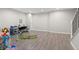Bright and spacious finished basement with laminate flooring and ample space for recreation at 24738 E Layton Pl, Aurora, CO 80016