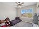 Bedroom with ceiling fan, carpet floors, one window and gray walls at 24738 E Layton Pl, Aurora, CO 80016