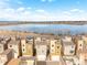 Townhomes with rooftop patios overlooking the lake at 2641 Channel Dr, Highlands Ranch, CO 80129