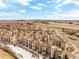 Panoramic aerial perspective showcasing the townhome community's convenient proximity to the highway at 2641 Channel Dr, Highlands Ranch, CO 80129