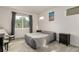 Bedroom featuring neutral carpet, bedside tables and a picturesque window at 2641 Channel Dr, Highlands Ranch, CO 80129