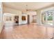 Spacious living room featuring wood floors and an open floor plan to the kitchen at 209 Saratoga Mine Dr, Castle Rock, CO 80108