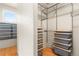 Custom walk-in closet with metal shelving for optimal storage at 209 Saratoga Mine Dr, Castle Rock, CO 80108