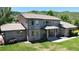 Charming two-story home with a well-maintained lawn and a picturesque mountain backdrop at 10886 Pheasant Run, Littleton, CO 80125