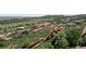 Scenic view of the neighborhood, featuring rock formations, trees, and upscale homes at 10886 Pheasant Run, Littleton, CO 80125