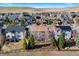 An aerial view of a suburban neighborhood on a clear, sunny day at 1788 Alpine Dr, Erie, CO 80516